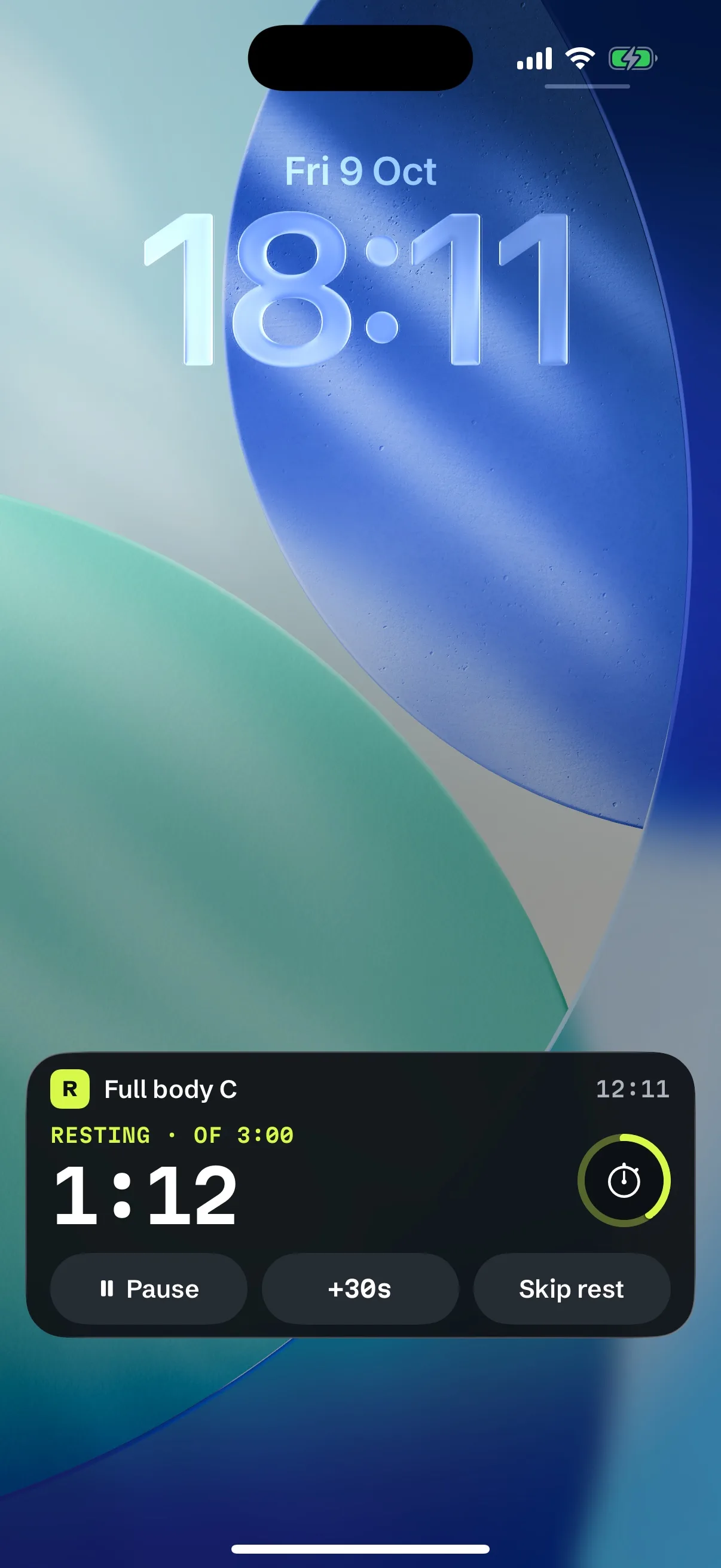 An iPhone Lock Screen with RIGOR's rest timer counting down, beside the words REST TIMER and a large 3:00 on a Volt ground: the rest a squat gets